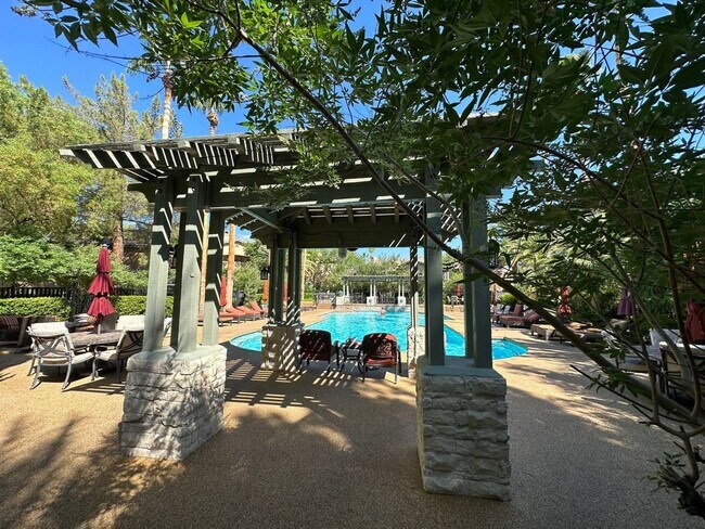 Building Photo - RESORT STYLE LIVING IN GUARD GATED COMMUNITY.