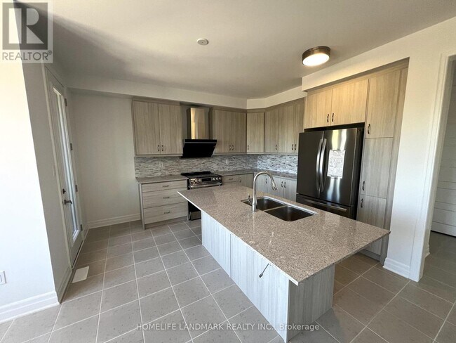 Photo du bâtiment - 25 Spring Oak Cres