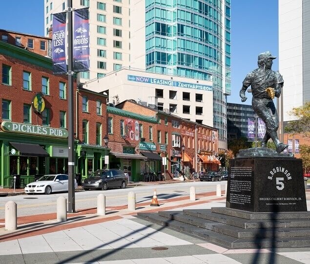 A statue of baseball player Brooks Robinson is located outside of Camden Yards