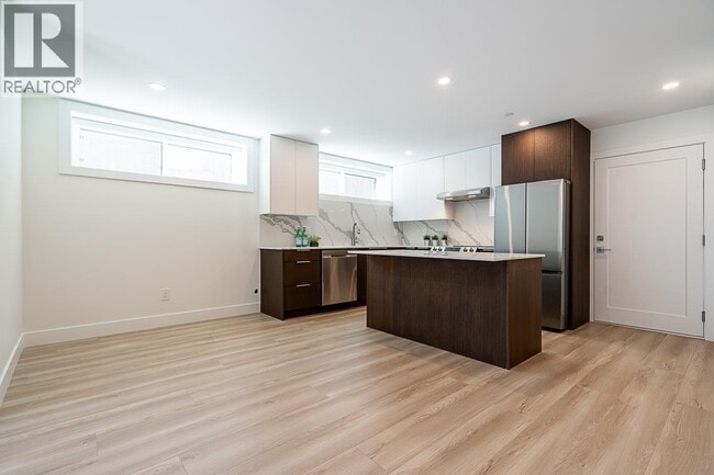 Photo du bâtiment - 30XX E 56th Ave