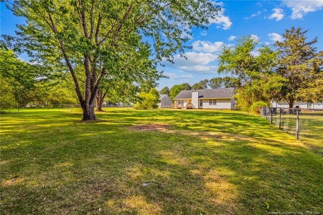 Building Photo - 6837 Woodmark Dr