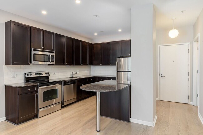 Foto del edificio - 565 W Quincy St