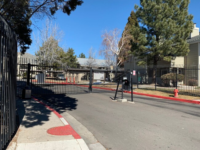 Building Photo - ENJOY THE POOL THIS SUMMER IN THIS GATED C...