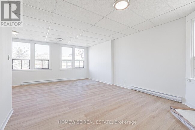 Building Photo - 571 St Clair Ave W