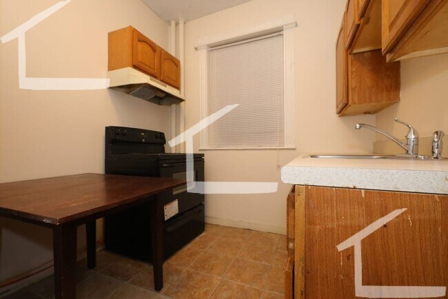 Foto del edificio - Bright & Spacious 2-Bedroom in Prime Allst...