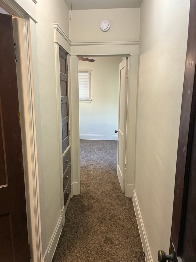 Hallway to bathroom and bedroom - all new paint and light fixtures - 18243 Sloane Ave