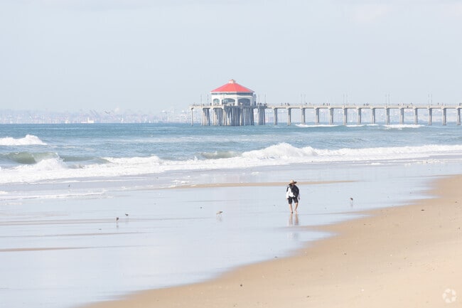 There's nothing like a calm walk on the beach in Huntington Beach.