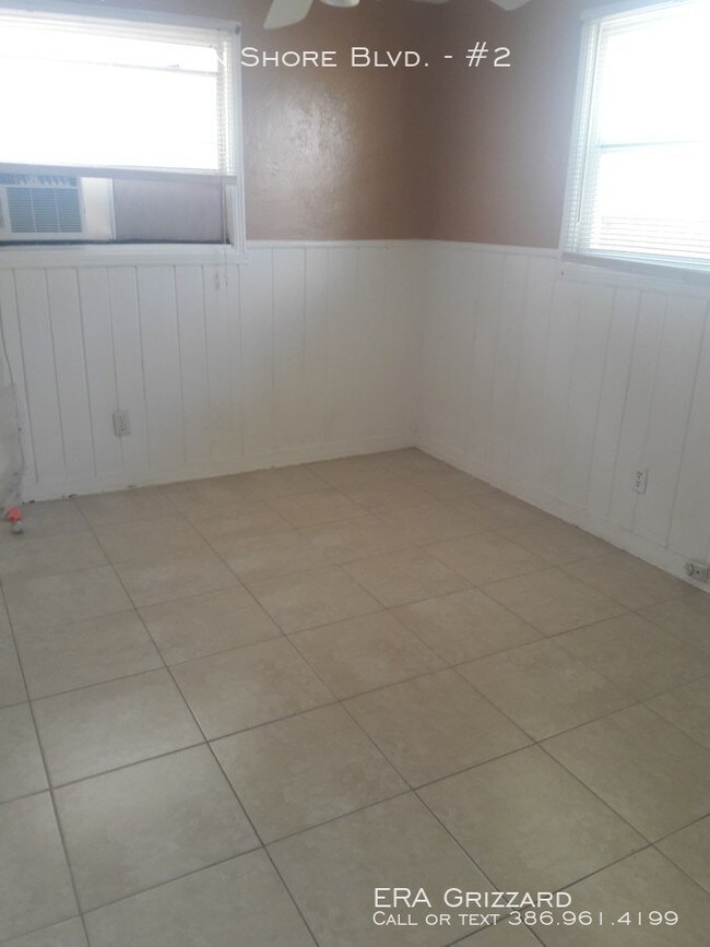 Building Photo - Affordable Beach Living!