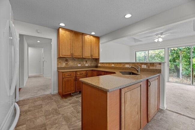 Building Photo - Live Where Others Vacation | Gated Community + Marina Access