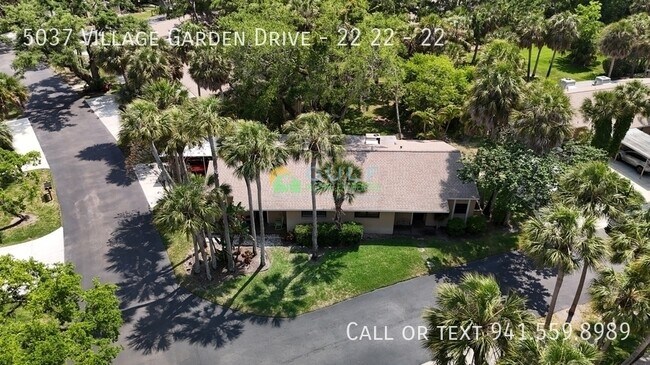 Foto del edificio - 5037 Village Garden Dr