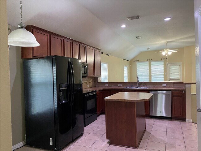 Foto del edificio - 7038 Cornflower Ln