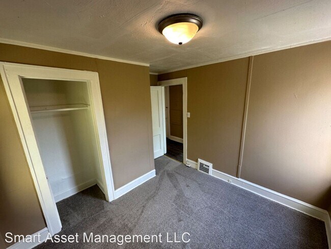 Building Photo - 3 br, 1 bath House - 1119 W Keefe Ave