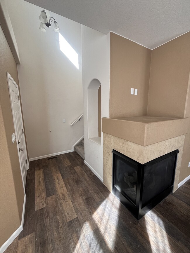 Living room with fireplace - 8662 quinn pointe