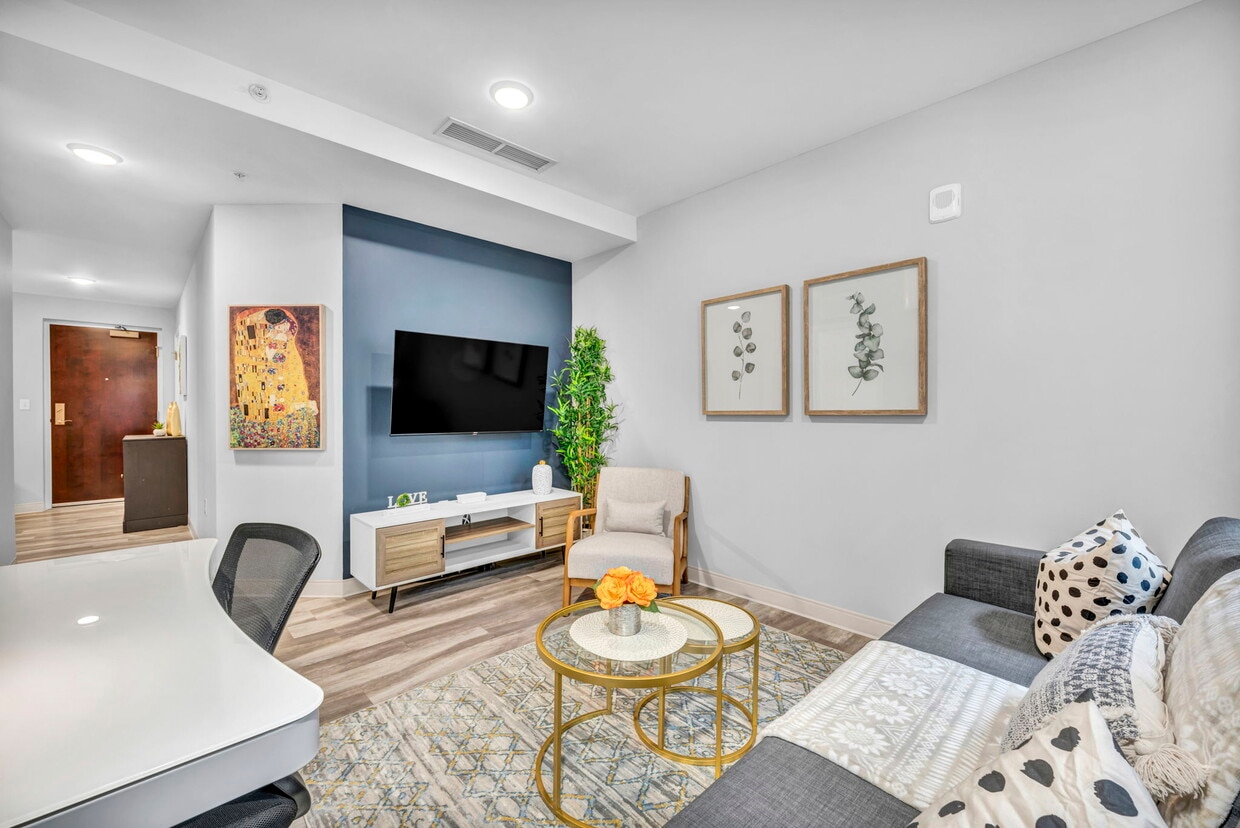 1BR, 1BA - 587SF - Living Room - The Athlon