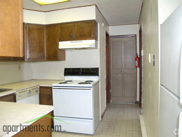 Kitchen - Apartments By The Park