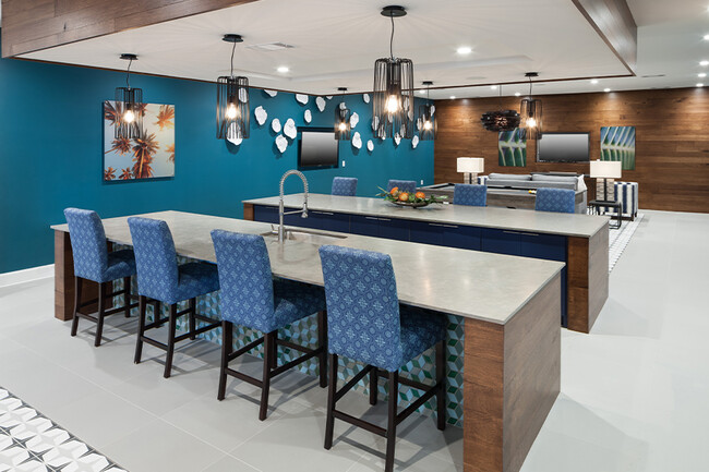 The rooftop lounge is perfect for entertaining with games, demonstration kitchen and TVs - Larq Henderson