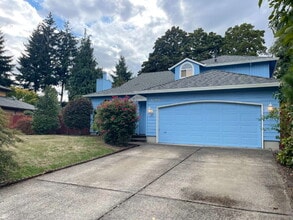 Building Photo - 1587 NE 57th Ave