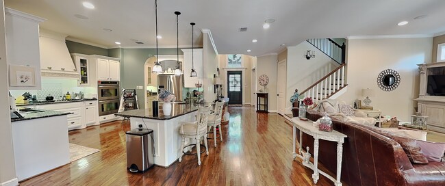 Building Photo - A Gated River Park Estate Where Timeless Tudor Elegance Meets Resort-Style Living