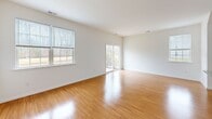 Located at 540 Kali Rd in Sicklerville, NJ, this two-story home offers a well-organized layout across two floors. The main level hosts the primary living areas, including a bright living room with gleaming hardwood floors and a window that fills the space with natural light, flowing seamlessly into a dining room. The kitchen is outfitted with rich dark cabinetry, granite-look countertops, subway tile backsplash, and stainless steel appliances including a gas range and built-in microwave. A pantry and utility room add to the functional design of the ground floor, which also includes an attached garage and laundry area.

The upper level is home to three bedrooms, each featuring warm hardwood flooring, neutral white walls, and natural light from well-placed windows. The generously sized primary bedroom includes a walk-in closet with wire shelving systems. Three full bathrooms are distributed throughout the home, each featuring dark wood vanities with white countertops and hardwood-style flooring. A classic wood-banistered staircase with white balusters connects the two floors. With six closets total and clean, consistent finishes throughout, this home offers a practical and comfortable living environment.
