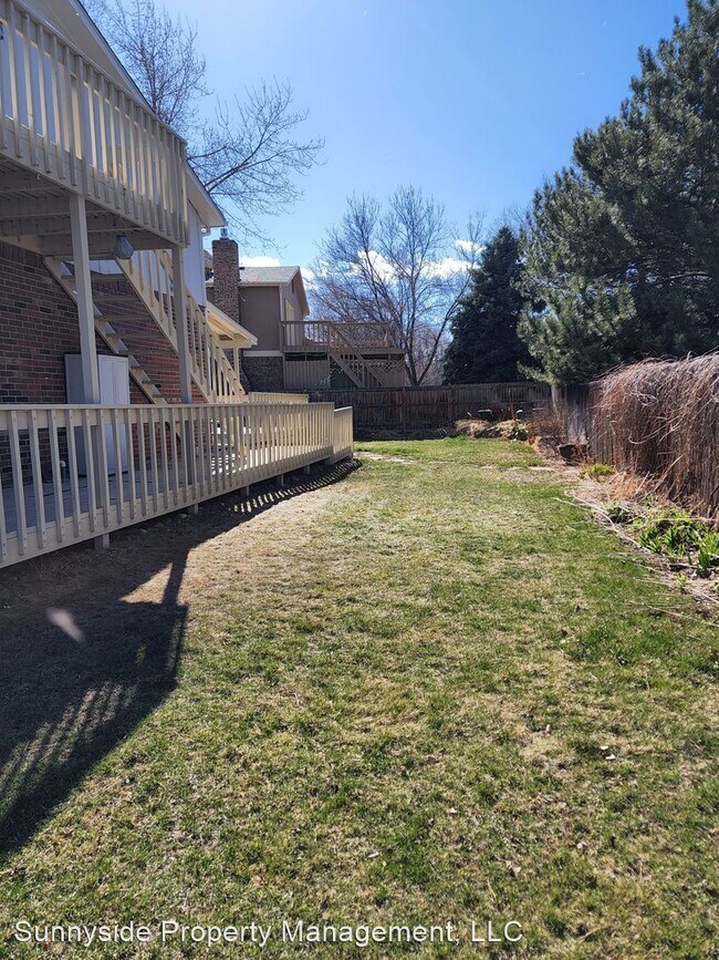 Building Photo - 4 br, 2.5 bath House - 13855 W 68th Dr.