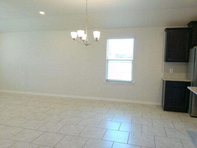 Foto del edificio - 7701 Lariat Toss Dr