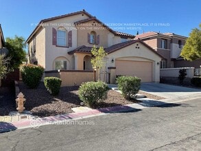 Building Photo - 11575 W Aruba Beach Ave