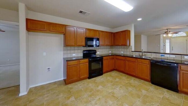Building Photo - Great 3/2 in Hutto Square!