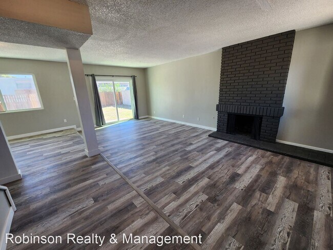 Building Photo - 4 br, 2.5 bath House - 3060 McLeod Dr