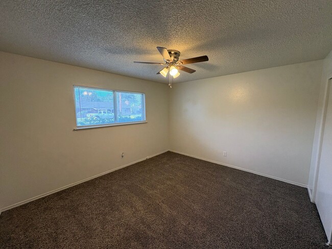 Building Photo - Corner lot home near Shopping Center Available Now!