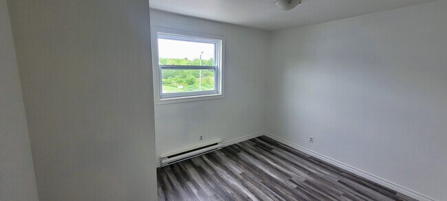 Photo du bâtiment - Comfortable Unit for Rent