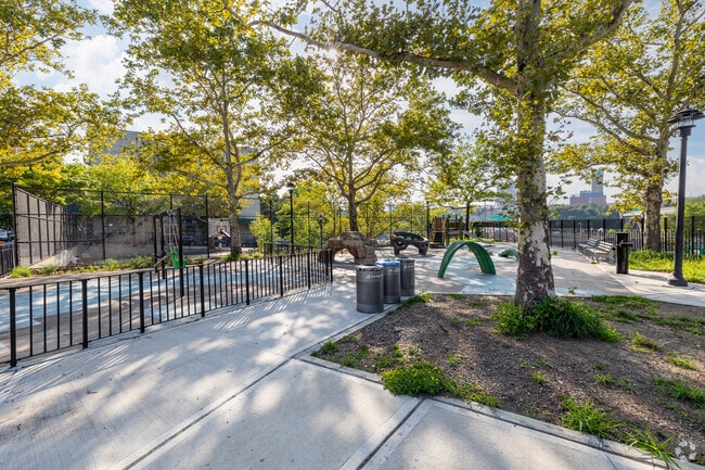 Bridge Playground in High Bridge New York features jungle gyms and ball courts.