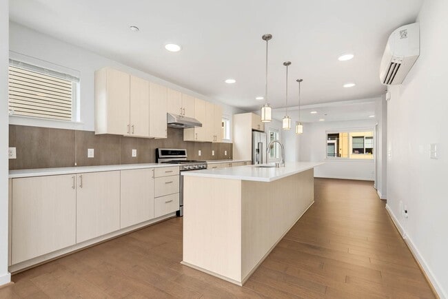 Building Photo - Modern Townhome in Upton at Crossroads Village – Stylish Living in a Prime Location