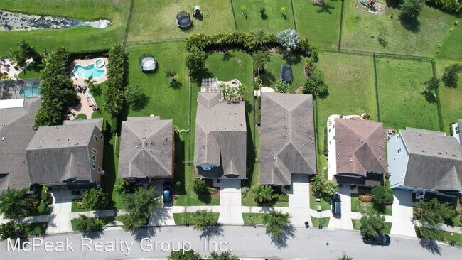 Foto del edificio - 4 br, 3 bath House - 6819 Park Strand Dr