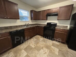 Building Photo - 5675 Laurel Ridge Cir