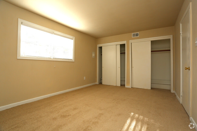 Bedroom with Ample Closet Space - The Sterling