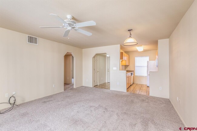 Living room to kitchen - 1100 Goeglein Gulch