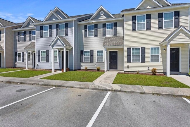 Building Photo - Minutes to OAJ Airport! Beautiful Townhomes!
