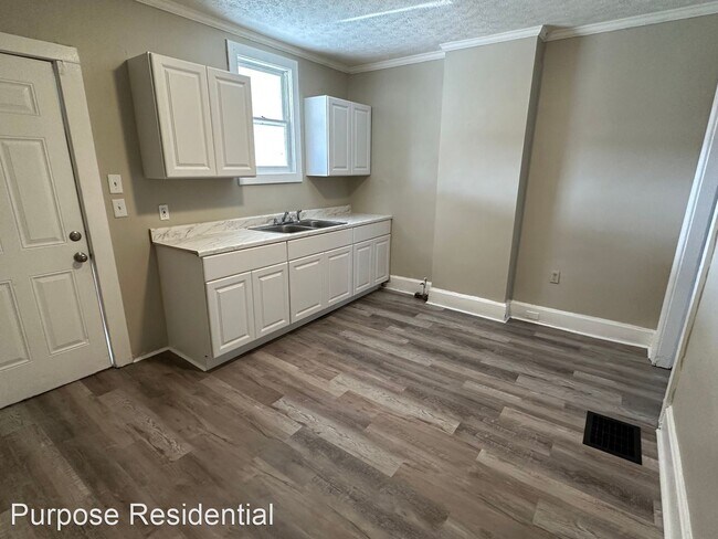 Building Photo - 3 br, 1 bath House - 1017 E. 16th Avenue