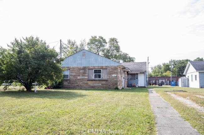 Building Photo - 5959 E 24th St