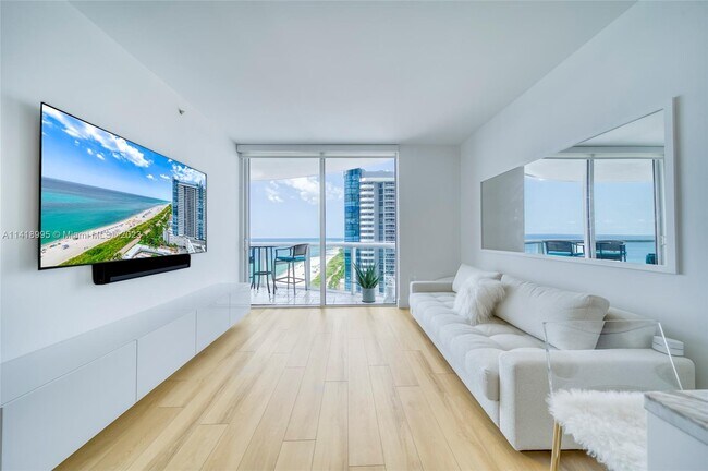 Building Photo - 6365 Collins Ave