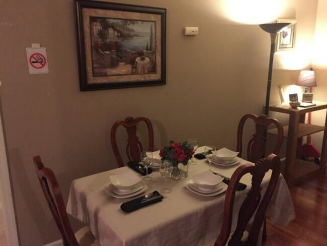 Living room - 9819 Glenburn Ln Apartments