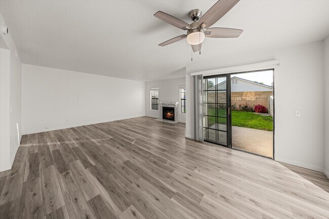 Building Photo - Large Renovated 3bed x 2.5bath Townhouse with Private Patio & 2-Car Garage