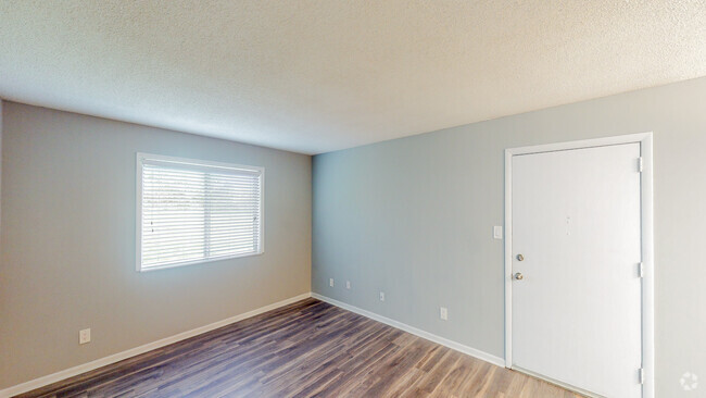 Living room - plank flooring - Willow Creek Apartments