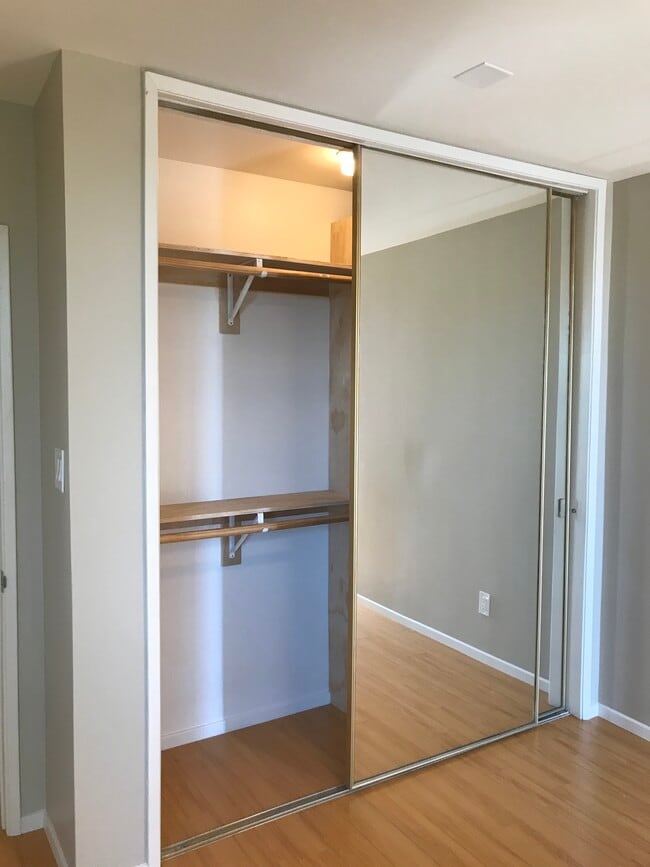 Double stacked closets for max storage. - 1211 Boston St