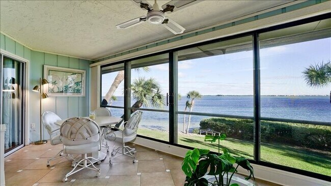 Back lanai w/water view - 6400 Flotilla Dr