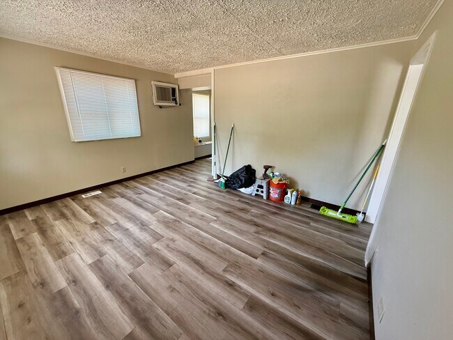 Living room - Cleaning in progress - 14119 E 8th Ave