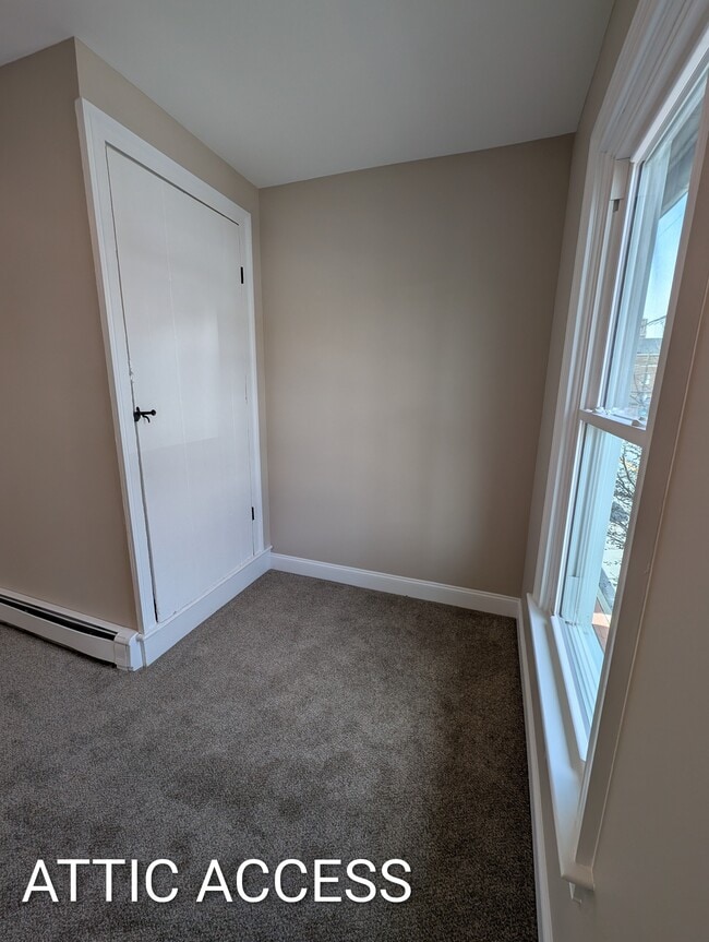 Living Room- Attic Access for Storage - 48 E Main St