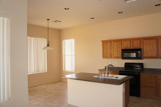 Building Photo - - Beautiful Home in Estrella Mountain Ranc...