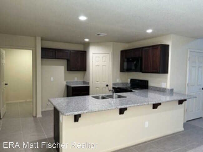 Building Photo - 4 br, 2.5 bath House - 7404 E. 38th Ln.