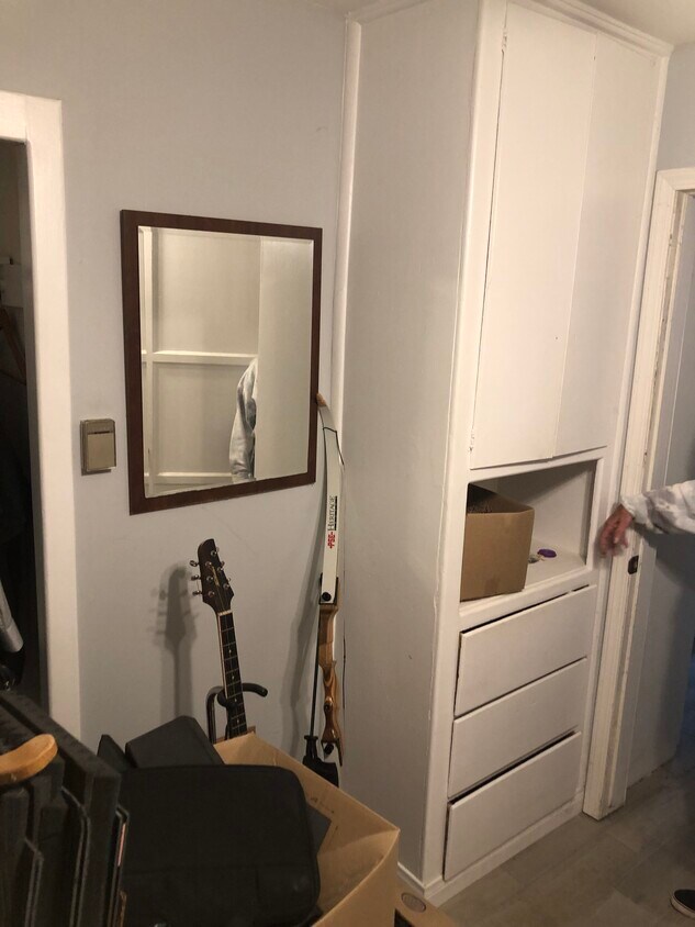 Hallway with closet space - 11343 Utopia Ave